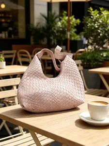 Sweet pink plush single shoulder heart-shaped handbag with delicate gold chain for cross-body carry,   niche design plush texture single shoulder bag,l commuting single shoulder handbag suitable for shopping, dating, afternoon tea, etc.