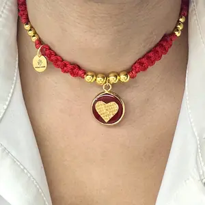 Braided and gold plated beads choker necklace in macrame and gold plated heart charm necklace