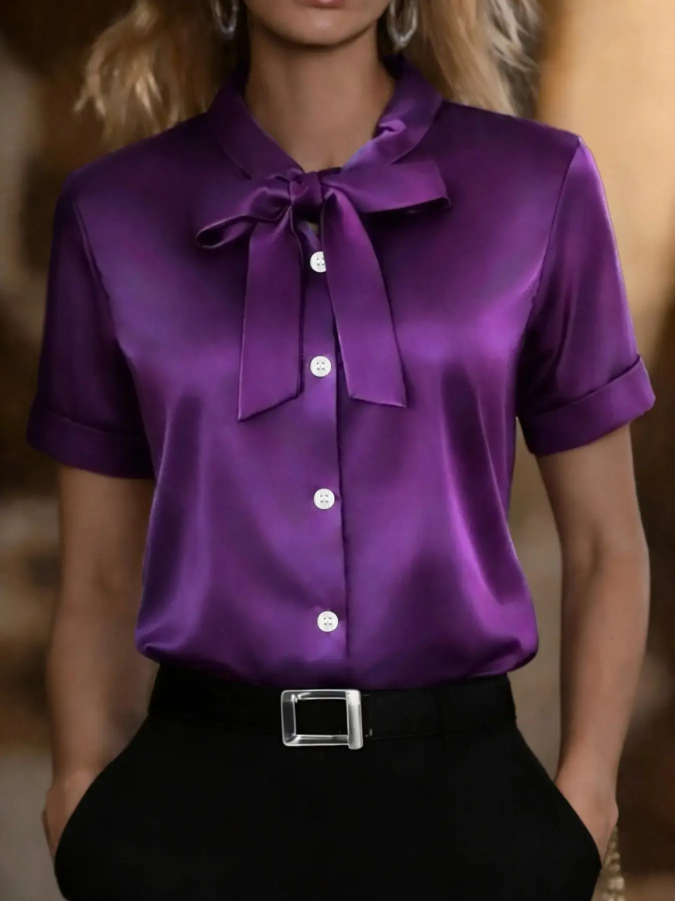 Classic short-sleeved satin shirt blouse with a ribbon detail at the neckline, fitted.Elegant solid color, perfect for spring and summer wear.A stylish women's top.