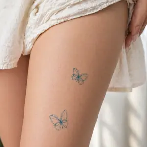 Whispering Butterflies Tattoo