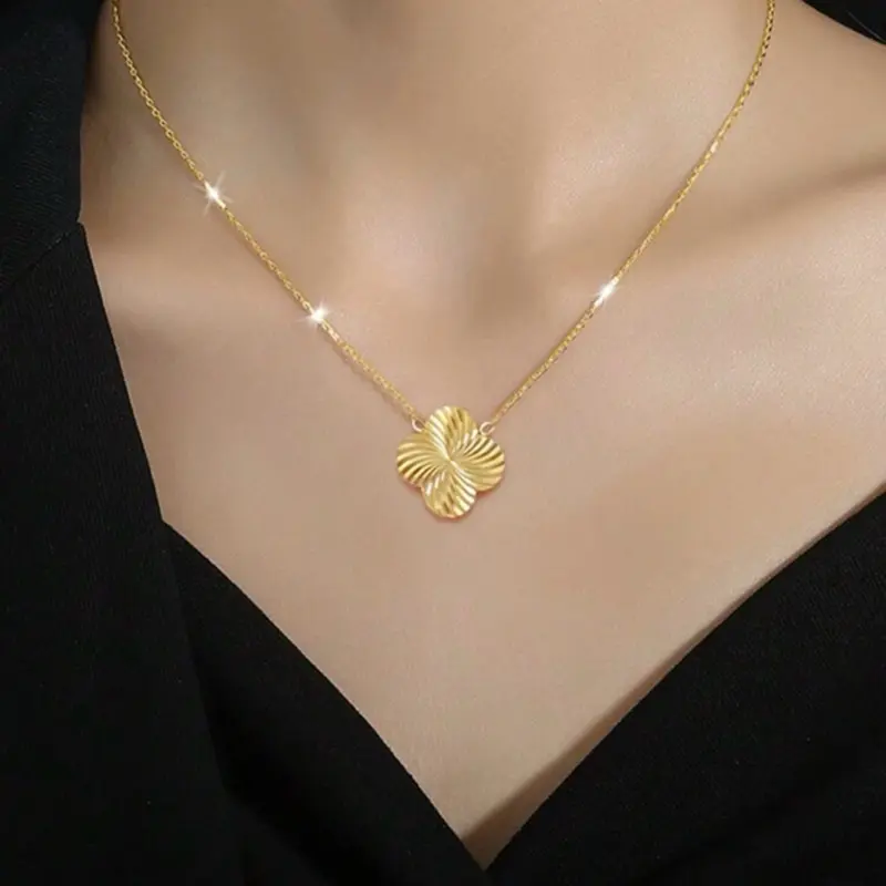 Gold clover bracelet and necklace for casual wear