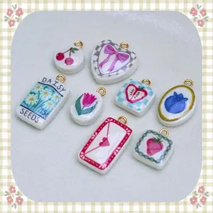 Handmade Polymer Clay Charms - Tiny Lucky Charms Boho Folk Picnic Date Set with Cherries Bow Heart Blueberry Bliss Apple Daisy Seed Packet Tulip Bloom Love Letter Strawberry Designs