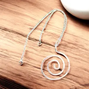Ocean Wave Necklace with Spiral Pendant - Holds Rings and Glasses - Stylish and Functional Jewelry Accessory