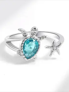 A Turtle and Star-shaped Ring Set with Blue Artificial Zirconia, Integrating Marine Element Design, Presents A Fresh and Vibrant Style, Suitable for Daily Wear and Party Occasions.