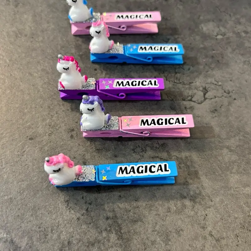 Magical Unicorn Sports Clips for gymnastics, Softball ,volleyball ,or cheer. Handcrafted Wooden Clothespins with Glitter & Plastic Charms - Perfect for Gymnastics, soccer, Basketball or any event! Set of 5 pins!