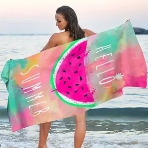 A summer beach towel with a colorful watermelon pattern and made of polyester, suitable for camping and beach use