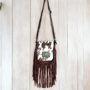 Cowhide conch fringe crossbody bag 