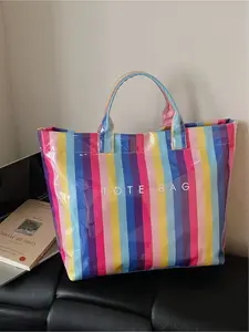 Large capacity, high aesthetic value, lightweight, high-end striped tote bag, PVC material, hand-held armpit bag, outdoor travel, shopping, commuting bag, handbag