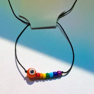 Orange Rainbow Evil Eye Pride Bracelet: beaded, minimalist, boho