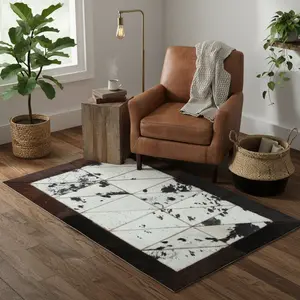 Rectangle Patchwork Rug – Speckled Cowhide with Bison Leather Border (2' x 6')