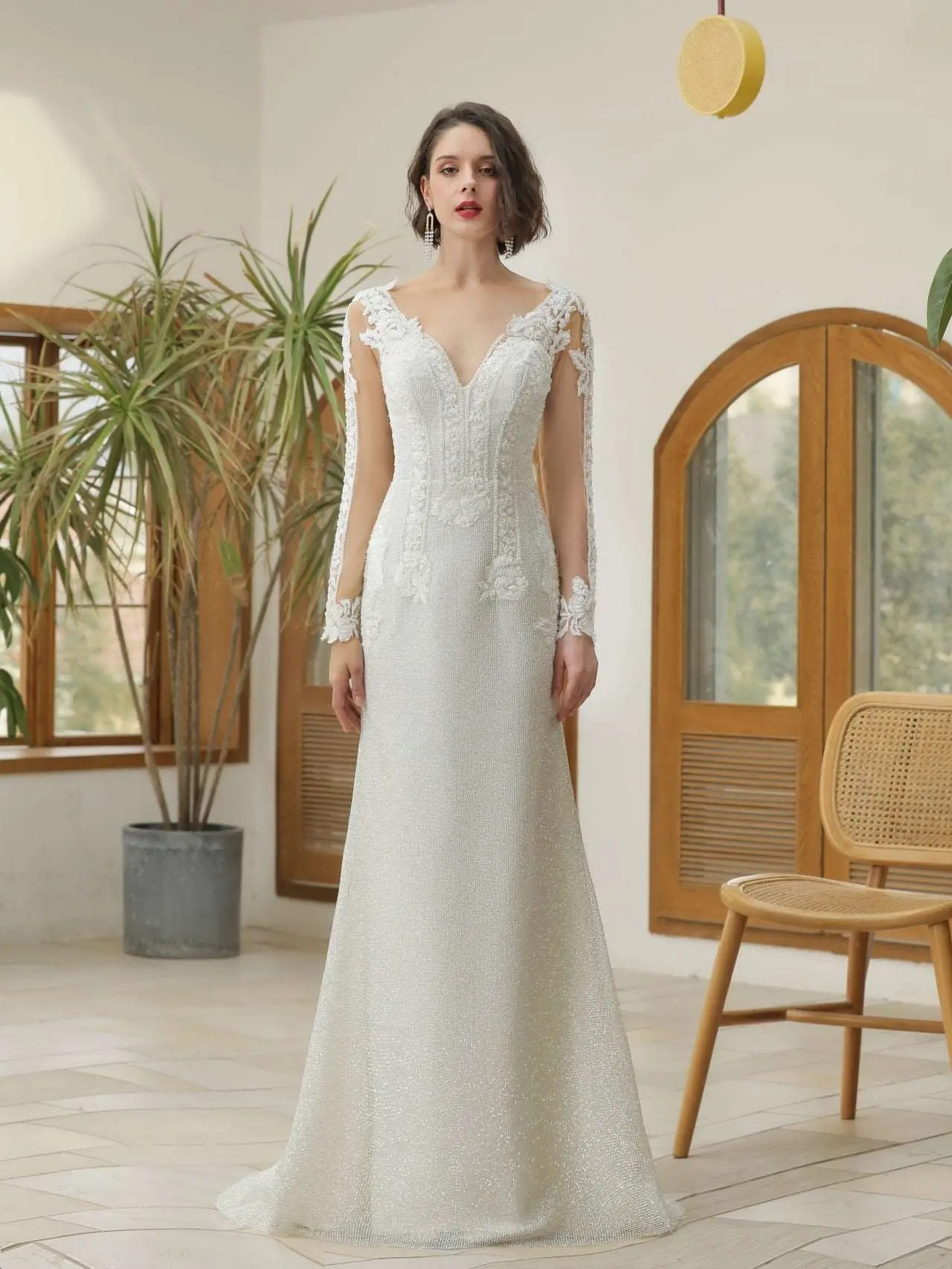 Women's Sheath Wedding Gown in Floral Lace and Glitter Tulle with Beaded Full Sleeves, a Sheer Back, and Long Train | Made to Order