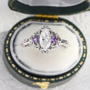 Unique Aurora Three Stone Marquise Moissanite and Tanzanite Ring