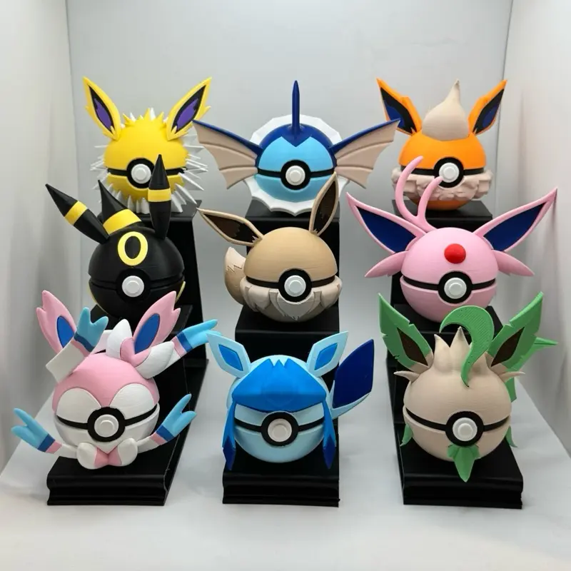 Eeveelusions Mini Pokeballs Themed Figure Set - N3D/The Card Guy Authentic Collectibles, All 8 Eevee Forms Miniature Things, Premium TCG Unique Looks Figurines with Black Stand