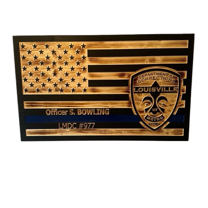 Custom engraved wooden American flags for police, firefighters, veterans or active duty military make great decor and hangable.