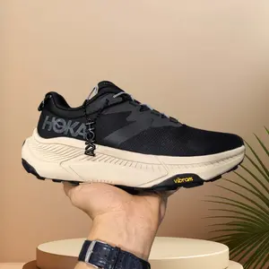 Casual, versatile, and comfortable low-top trail-running shoes for urban commuting and running. Men's style in black and white