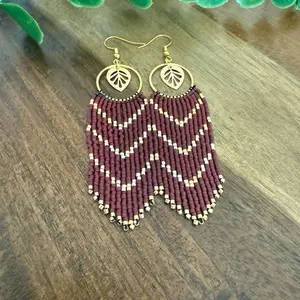 Handcrafted Maroon Beaded Earrings with Gold Leaf Accents and Fringe Design for Women's Fashion