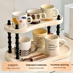 Desk Organizer Savior! This 2-tier storage rack has MAX load capacity, fits all your mugs and utensils! The cream white 2-tier mug rack instantly tidies up your desk and brings that cozy, aesthetic vibe
