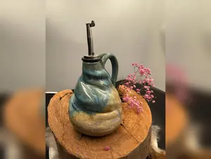 Wonderfully Wonky oil decanter hand made stoneware pottery.