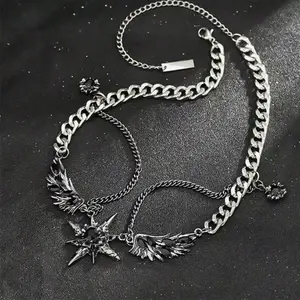 Silver Wing Pendant Necklace – Sun & Wing Design - Silver necklace with wing details and a dark sun pendant for a bold, modern look.