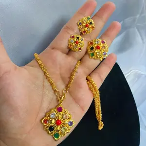 Gold Tone Navratna Necklace with Matching Earrings and Adjustable Finger Rings for Elegant Outfits