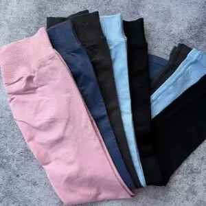 With logo: Women’s seamless high-stretch fitness leggings featuring butt-shaping and gathered hem design for ultimate comfort and core support; nylon content: 90%, spandex content: 10%; precise fit.