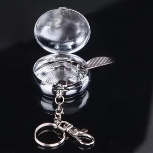 1pc Random Style Creative Lidded Ashtray, Mini Portable Stainless Steel Stylish Keychain Ashtray, perfect for on-the-go use, car use, and home decor.