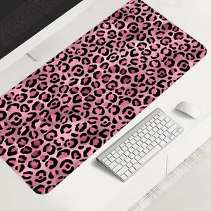 Pink leopard print large-sized gaming mouse pad, aesthetic animal pattern desktop protection pad, anti-slip rubber lock edge high-definition printing, suitable for computers, laptops, offices, homes, schools, as a gift for family and friends.