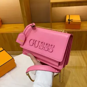 Pink Crossbody Bag with Chain Strap and Embossed Logo