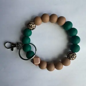 Customizable Wristlet - Multi-Color Bead Bracelet with Metal Clasp and Keychain Attachment.