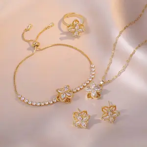 Rotating four-leaf flower inlaid with zircon pendant earrings ring set clavicle necklace necklace female girlfriends jewelry
