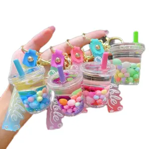 Pink Tea Shaped Keychain with Cute Pendant for Couples, Includes Bag, Clothes & Laptop with Liquid Sand Inside
