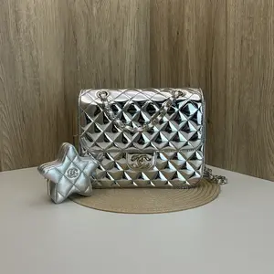 Pre-owned CHANEL 24C Cruise Collection Chip Style Silver Mirrored Diamond Quilted Star Pattern Flap Bag/Backpack 866