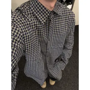 Men's Black - and - White Checked Shirt, a retro - style plaid long - sleeve shirt for spring and autumn, suitable as innerwear.