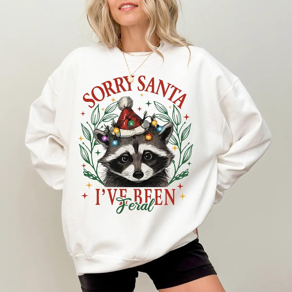 Sorry Santa I’ve Been Feral Christmas Sweatshirt, Funny Raccoon Graphic Crewneck, Feral Raccoon Xmas Pullover, Holiday Gift for Women
