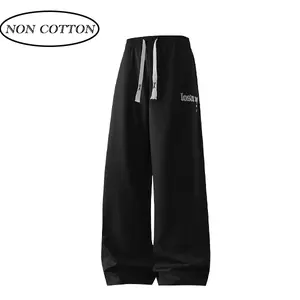 Men’s casual pants made from polyester fiber, featuring a stretchy solid-color long design with a loose fit and letter print pattern with pockets. An elastic waistband is equipped with a drawstring for adjustable tightness, balancing comfort with a stylis