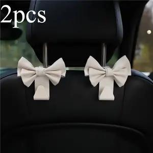 2 car mounted hooks, leather bow, car seat back, load-bearing storage hooks, fashionable goddess car accessories, Car Seat Decorative