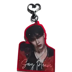 Chan Keychain - Red Design with Heart Charm, Featuring a Graphic Print, Includes Keyring Attachment