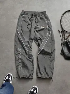 Men's Sporty Casual Long Pants, Athleisure Style Bottoms, 100% Polyester, Colorblock Curved Lines, Quick-Dry Breathable, Elastic Drawstring Waist + Cuffed, Loose Fit Street Style Joggers
