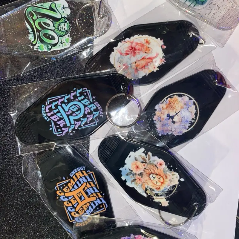 Zodiac Hotel Keychains - Colorful Design with Unique Zodiac Signs and Decorative Elements