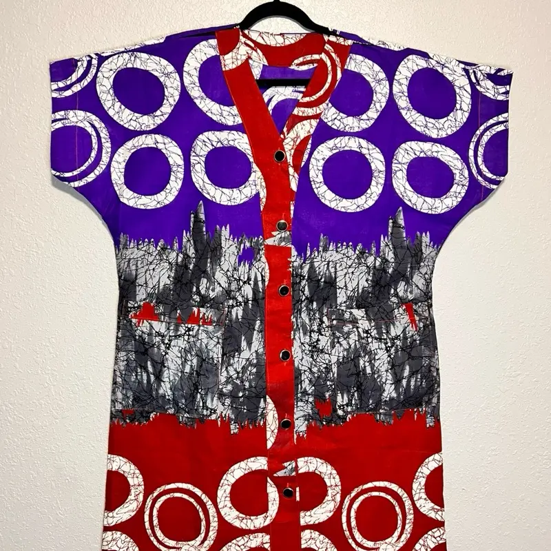 African Kimono with Vibrant Print Design Front Button Closure for Easy Wear Comfortable and Versatile for Various Occasions