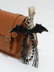 Atmosphere lace decorative bag pendant, Bag charm keychain, personalized bat wing pendant, decorated with black and red beads and heart-shaped key elements, lightweight and easy to carry, can be given to friends