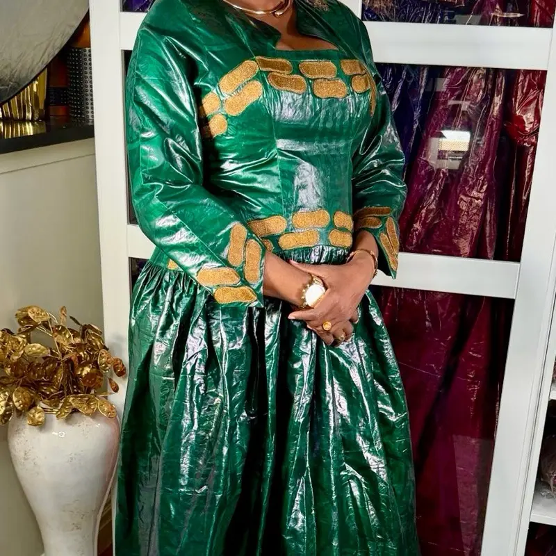 Emerald Royalty Bazin Gown - Green with Gold Accents, Long Sleeve, Elegant Design, Perfect for Special Occasions - TikTok Shop Emerald Royalty Bazin Gown - Green with Gold Accents, Long Sleeve, Elegant Design, Perfect for Special Occasions - TikTok Shop