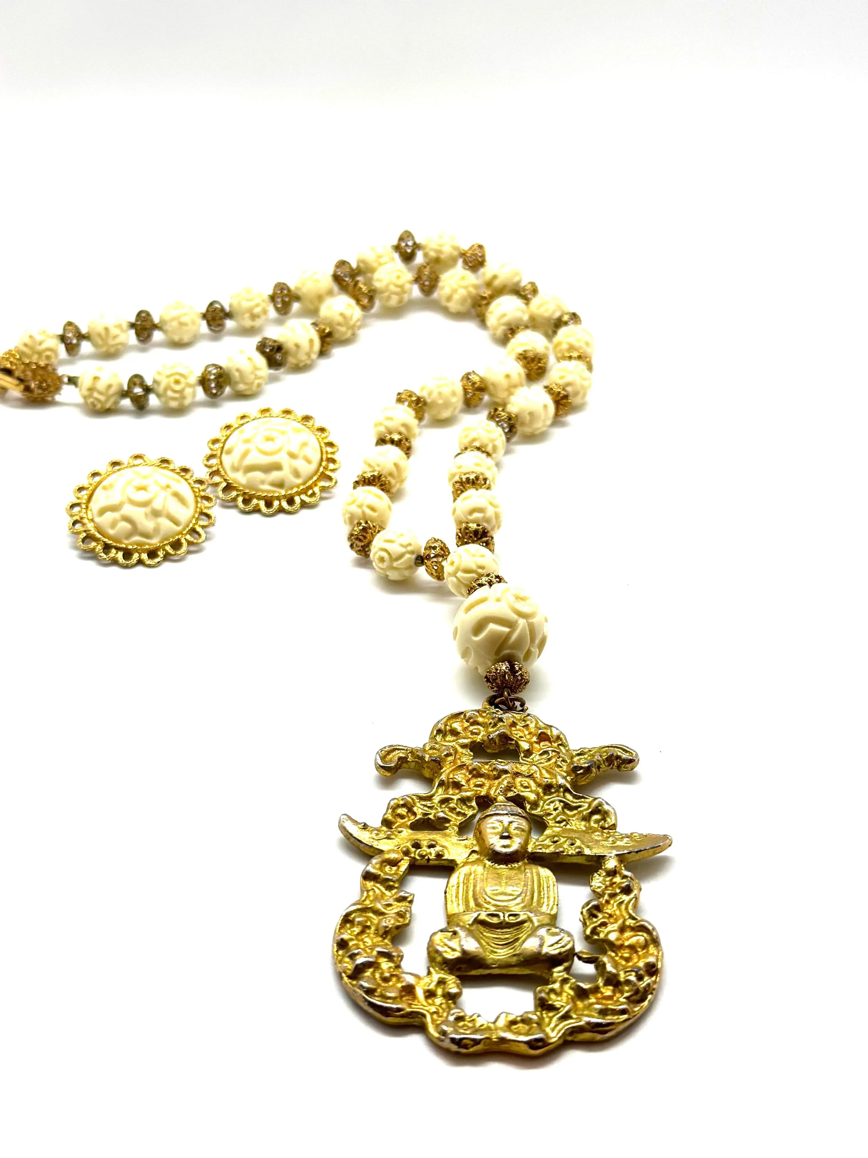 VINTAGE 1950's BUDDHA STATEMENT NECKLACE/EARRINGS WITH WHITE RESIN AND GOLDTONE