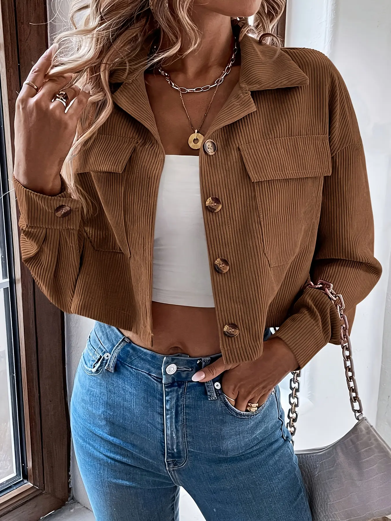 A women's brown buttoned-collar short woven Fabric long sleeve fitted collared jacket coats with a lapel, featuring a simple and elegant style, is highly versatile and suitable for casual wear Womenswear