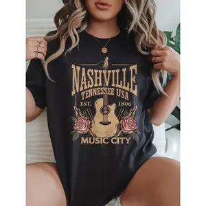 Nashville Music City Graphic Tee: Edgy Guitar & Roses Print on Soft, Oversized Womens T-Shirt. Perfect for Concerts, Travel & Casual Street Style. Tennessee USA Vintage Vibe.