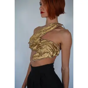 Golden one shoulder wet look corset