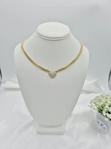 Cuban link necklace with heart pendant, 14k gold plated. Elegant and timeless.