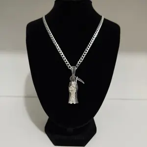 Santa Muerte pendant with a 5mm Solid Cuban chain, both in 925 silver.