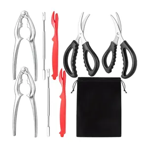 9-piece seafood cracker tool set includes stainless steel crab crackers, lobster shellers, forks, scissors, and a storage bag for easy use. Kitchen Utensils