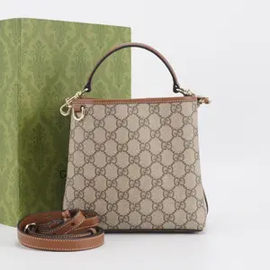 Pre-owned canvas Shoulder Bags Gucci GG Emblem mini bucket bag BGP214658